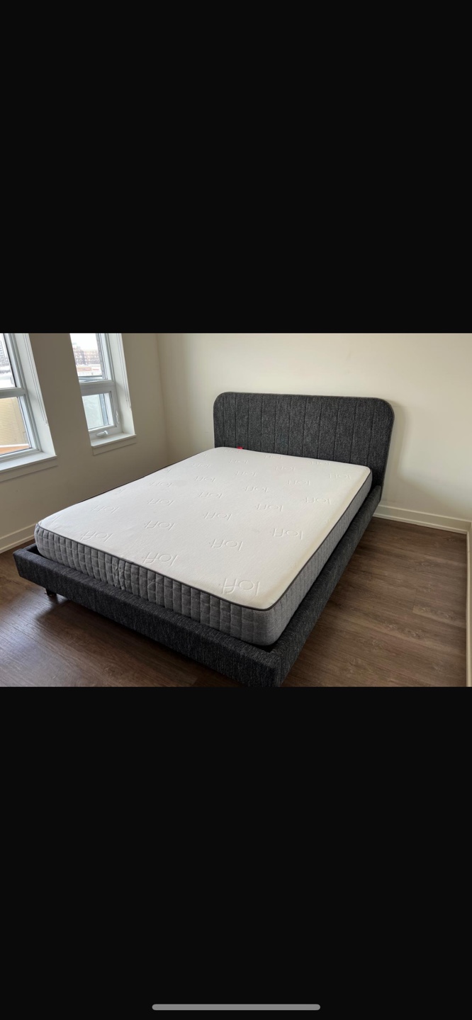 Queen-size bed frame with mattress