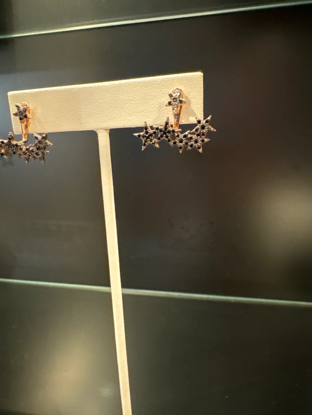 Rose gold star with black bezels stones image indicator(2)