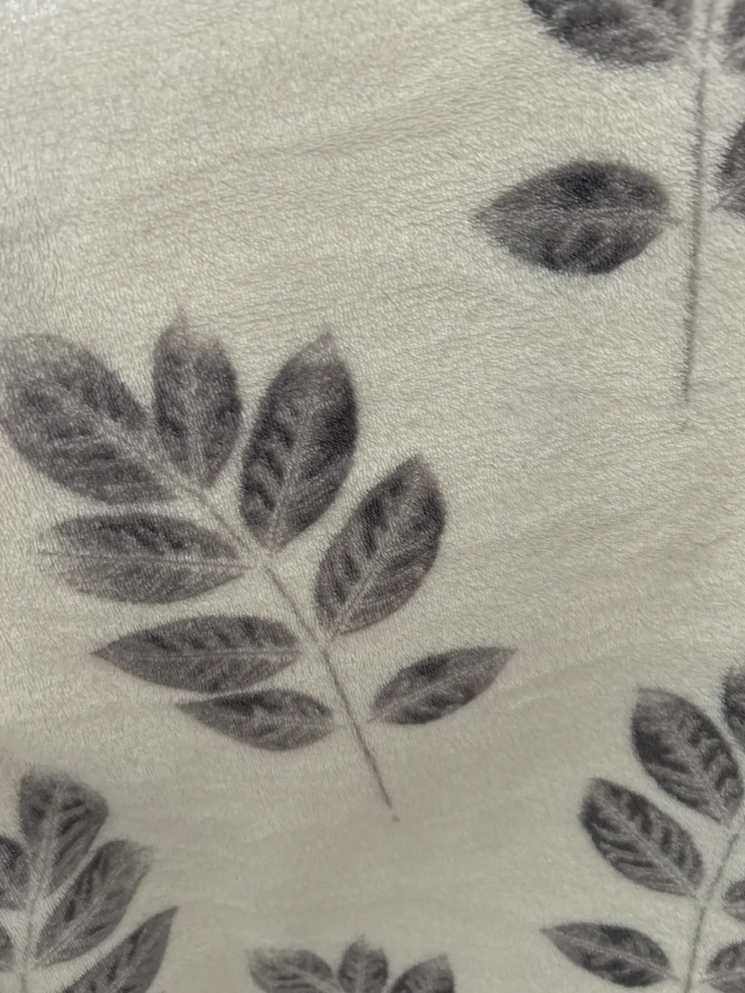 Three Cozy Blankets - Geometric, Leaf, and Solid Grey image indicator(2)