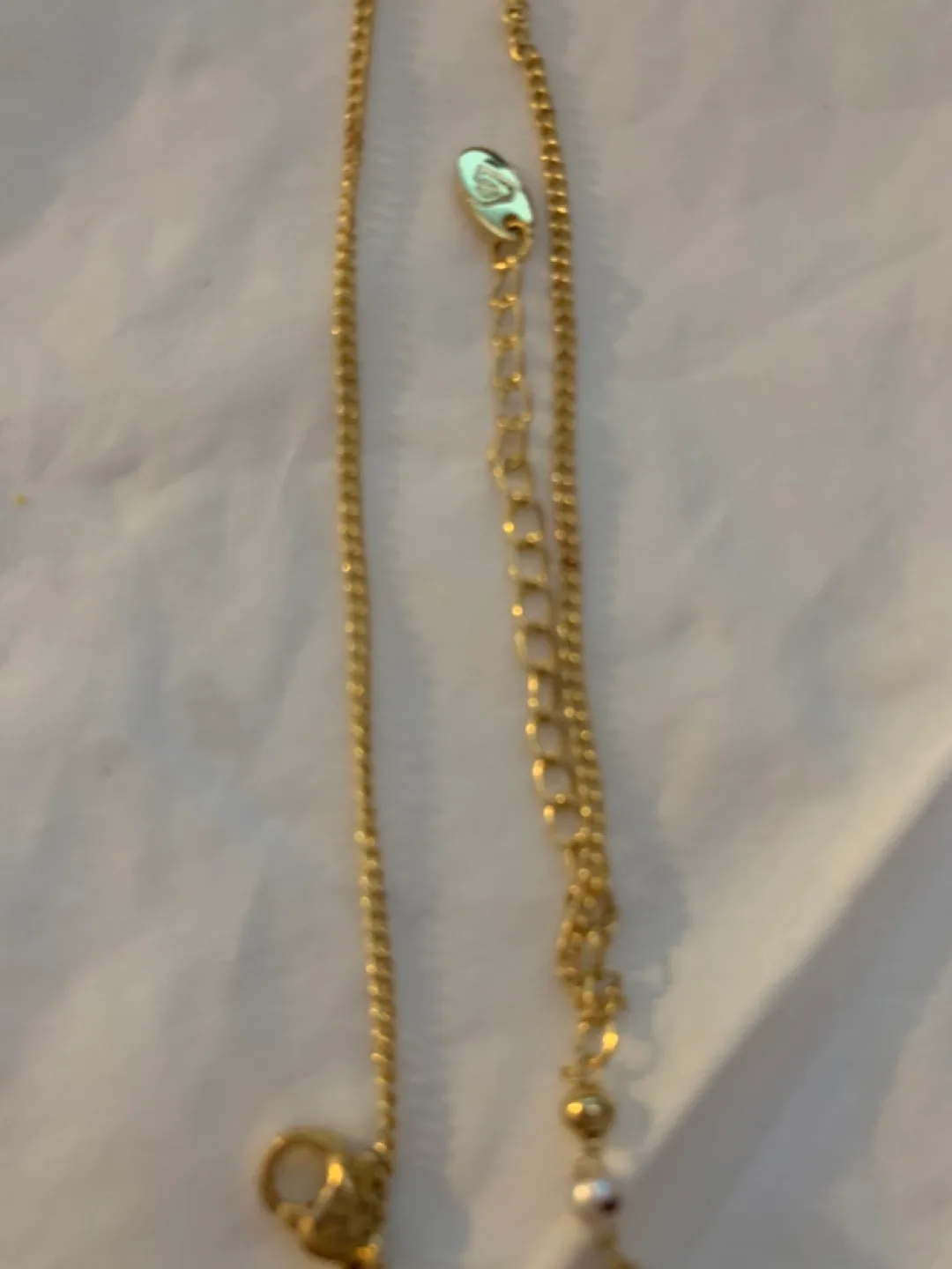 Gold Layered Pearl bracelet with Turquoise Pendant image indicator(4)