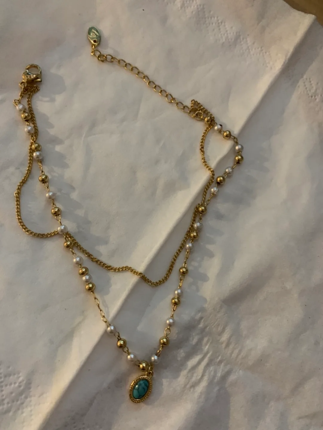 Gold Layered Pearl bracelet with Turquoise Pendant image indicator(3)