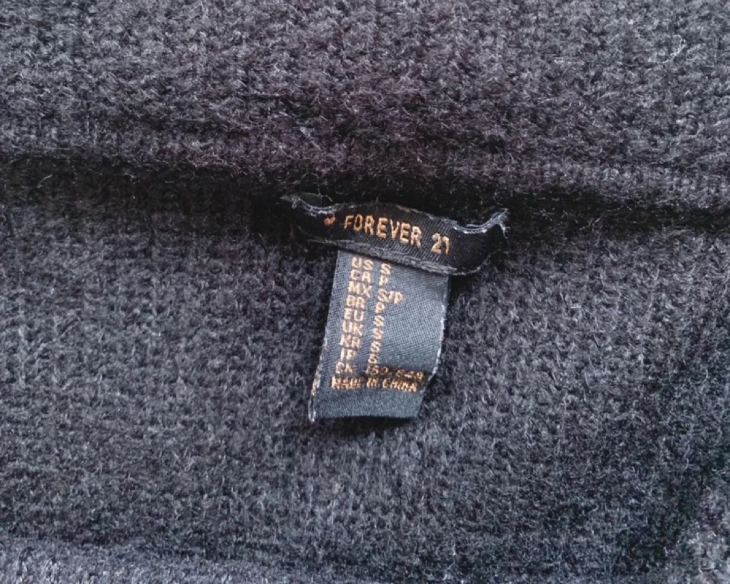 Black Off-the-Shoulder Knit Sweater - Size Small image indicator(3)