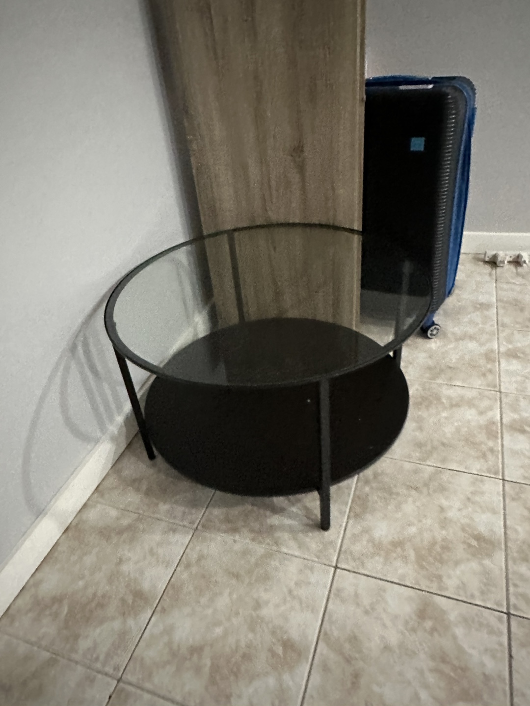 Round Glass Coffee Table with Black Metal Frame