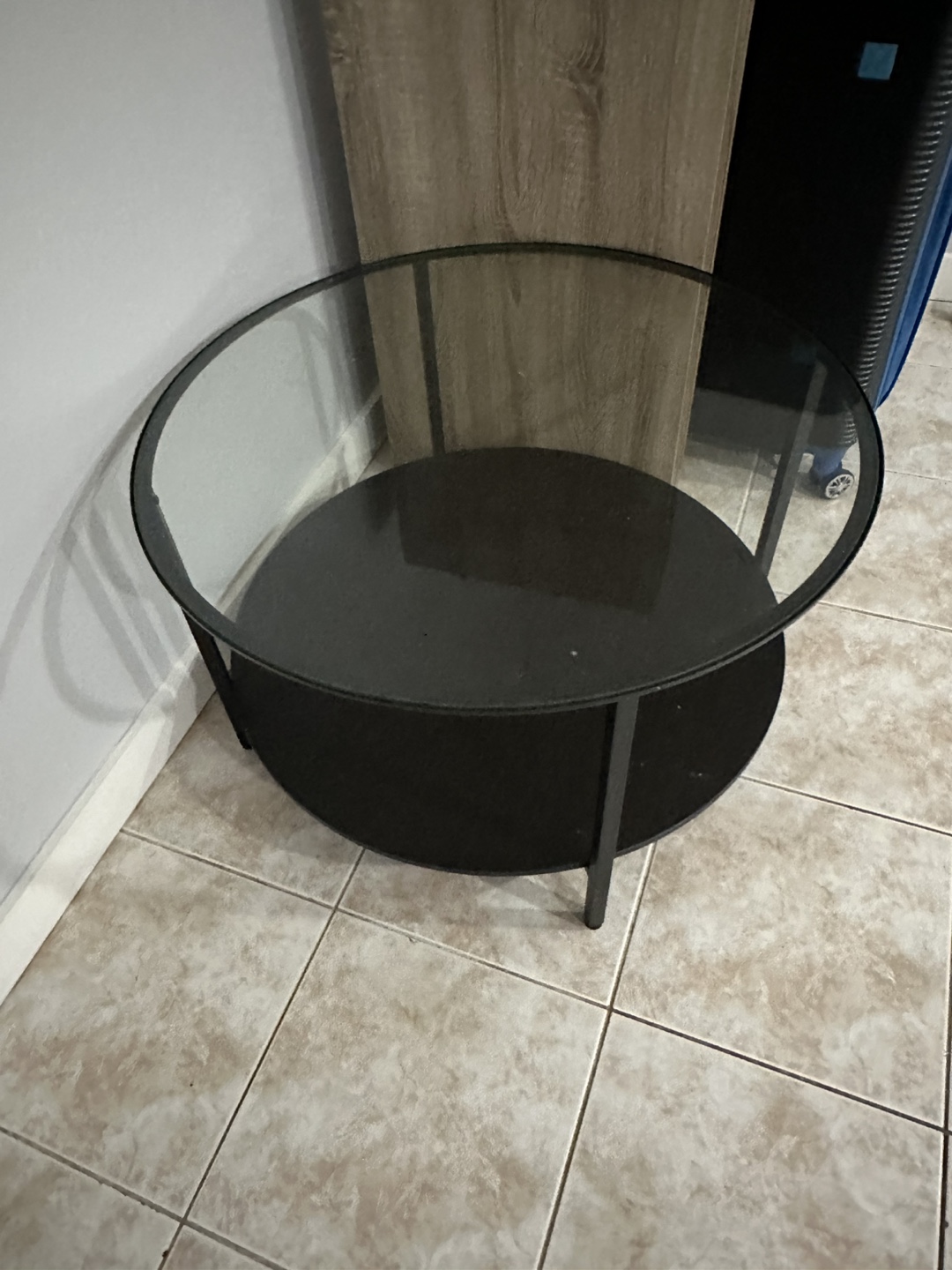 Round Glass Coffee Table with Black Metal Frame - photo 2
