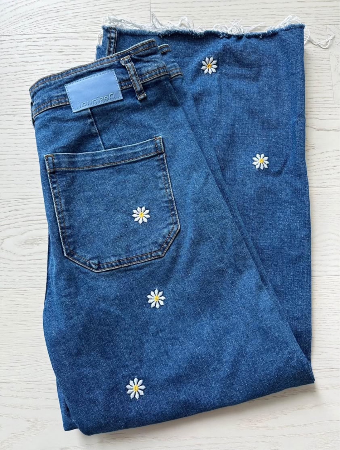 Daisy embroidered wide leg jeans