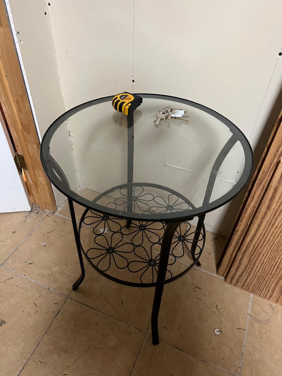 Glass-top side table with metal base