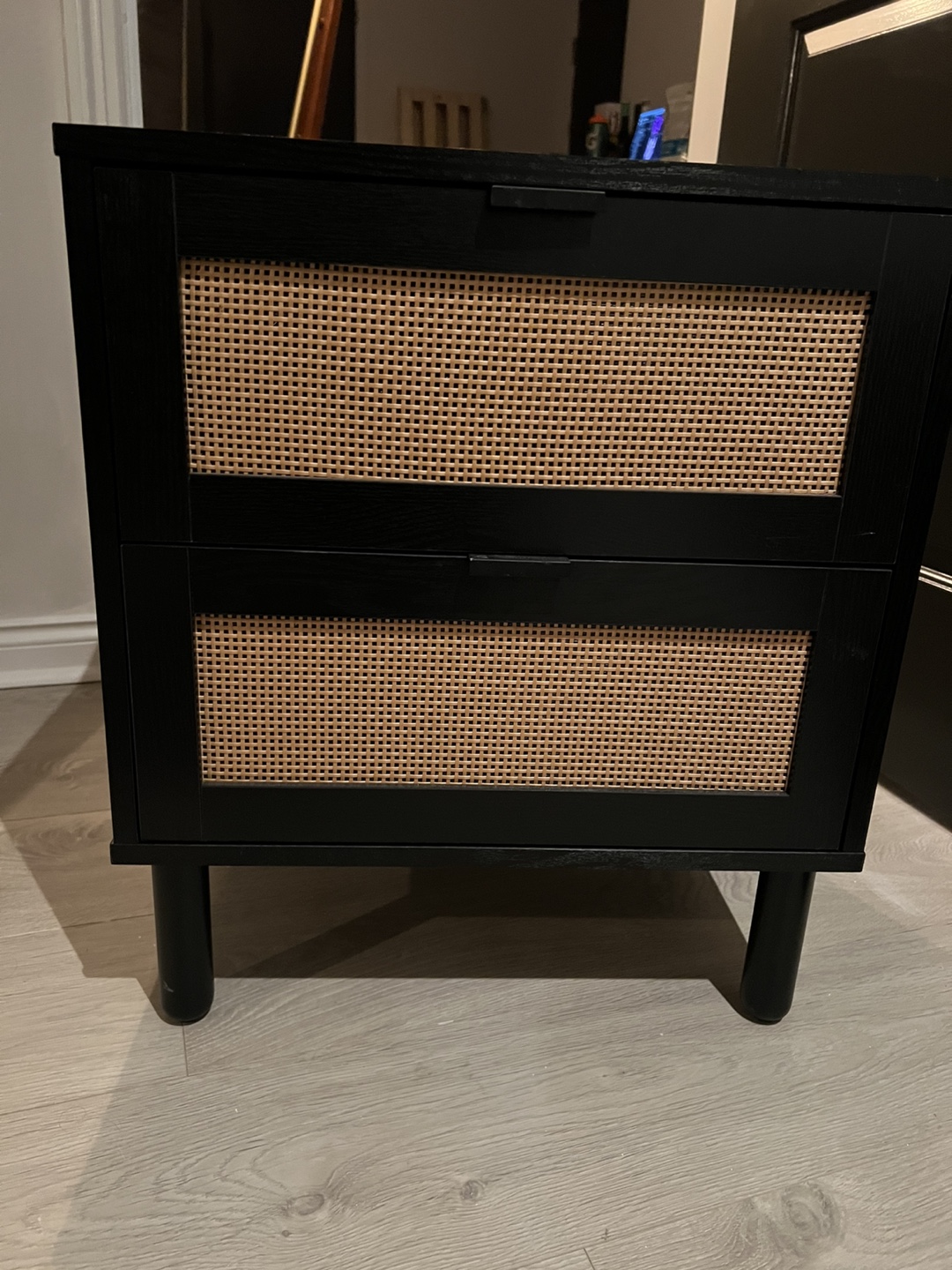 Black Two-Drawer Nightstand with Rattan Accents