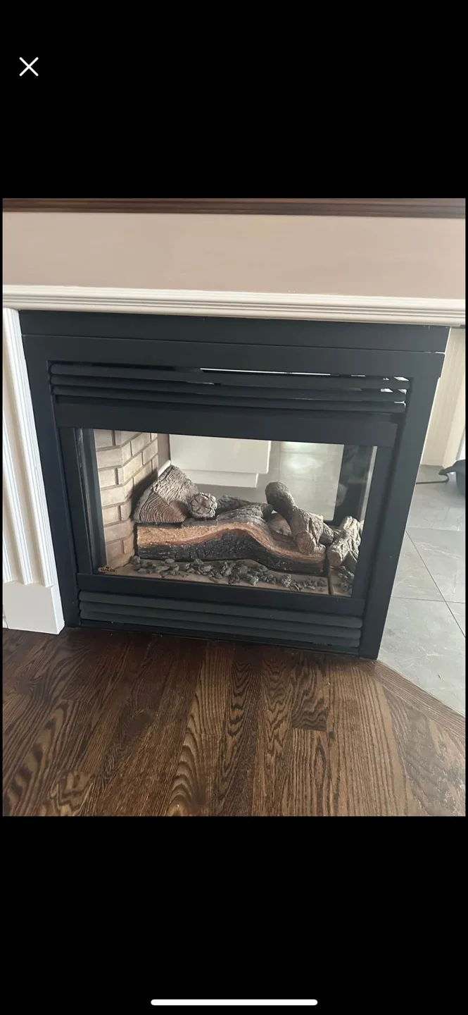 Propane Napoleon 3 sided fireplace thumbnail