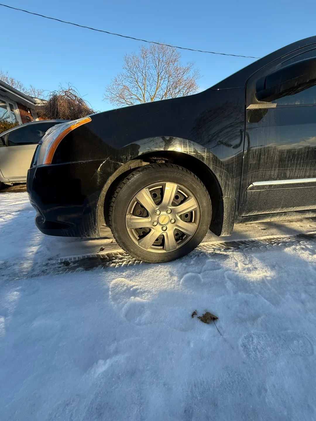 2012 Nissan Sentra - Black Sedan image indicator(5)