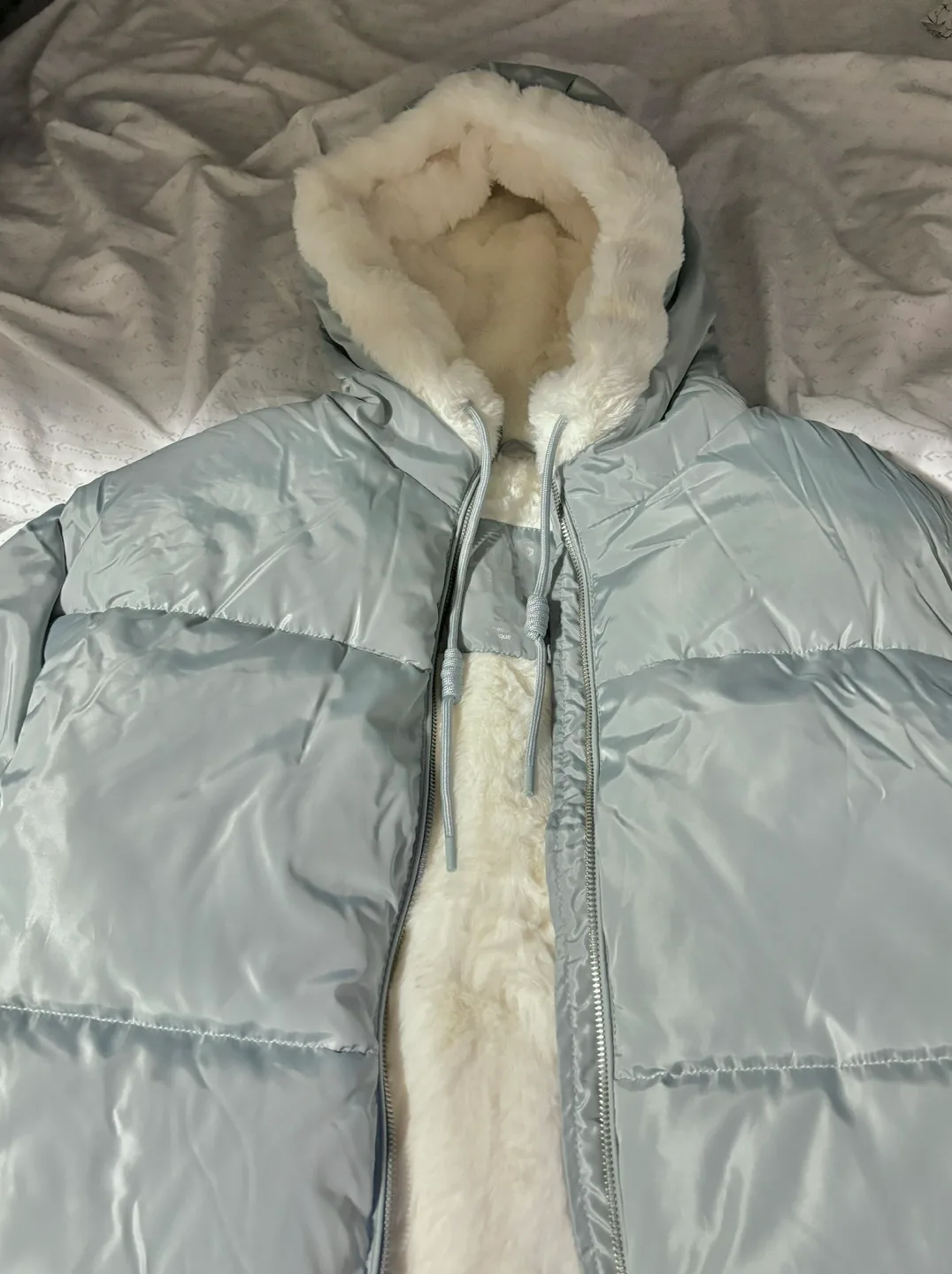 Blue puffer jacket image indicator(3)