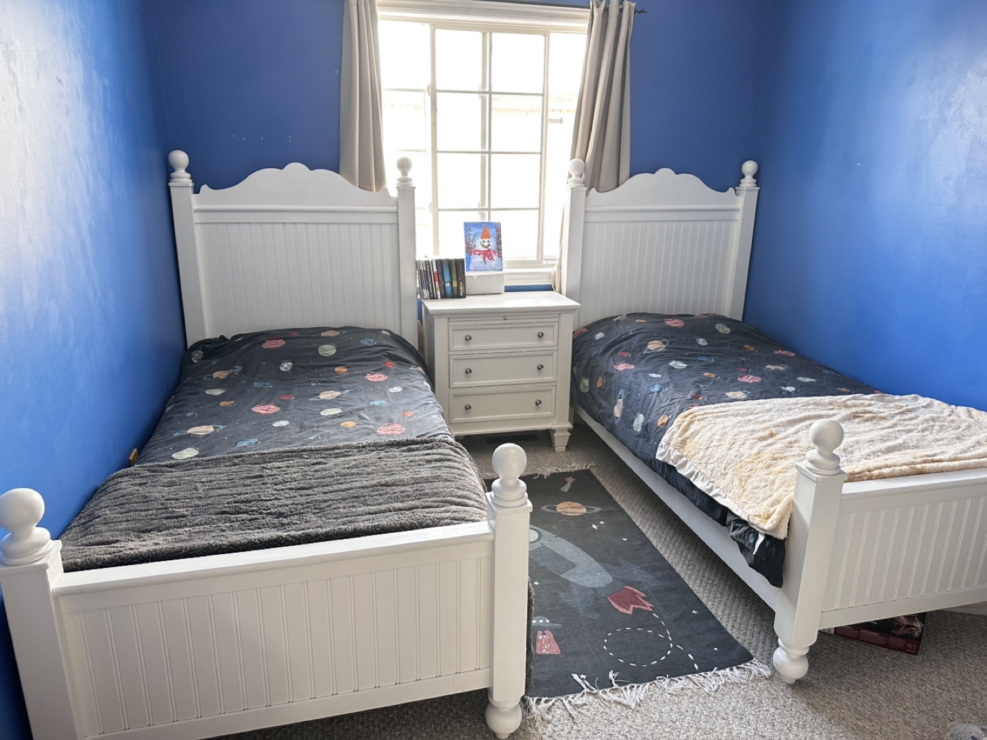 White Twin Beds with Vertical Panel Headboards