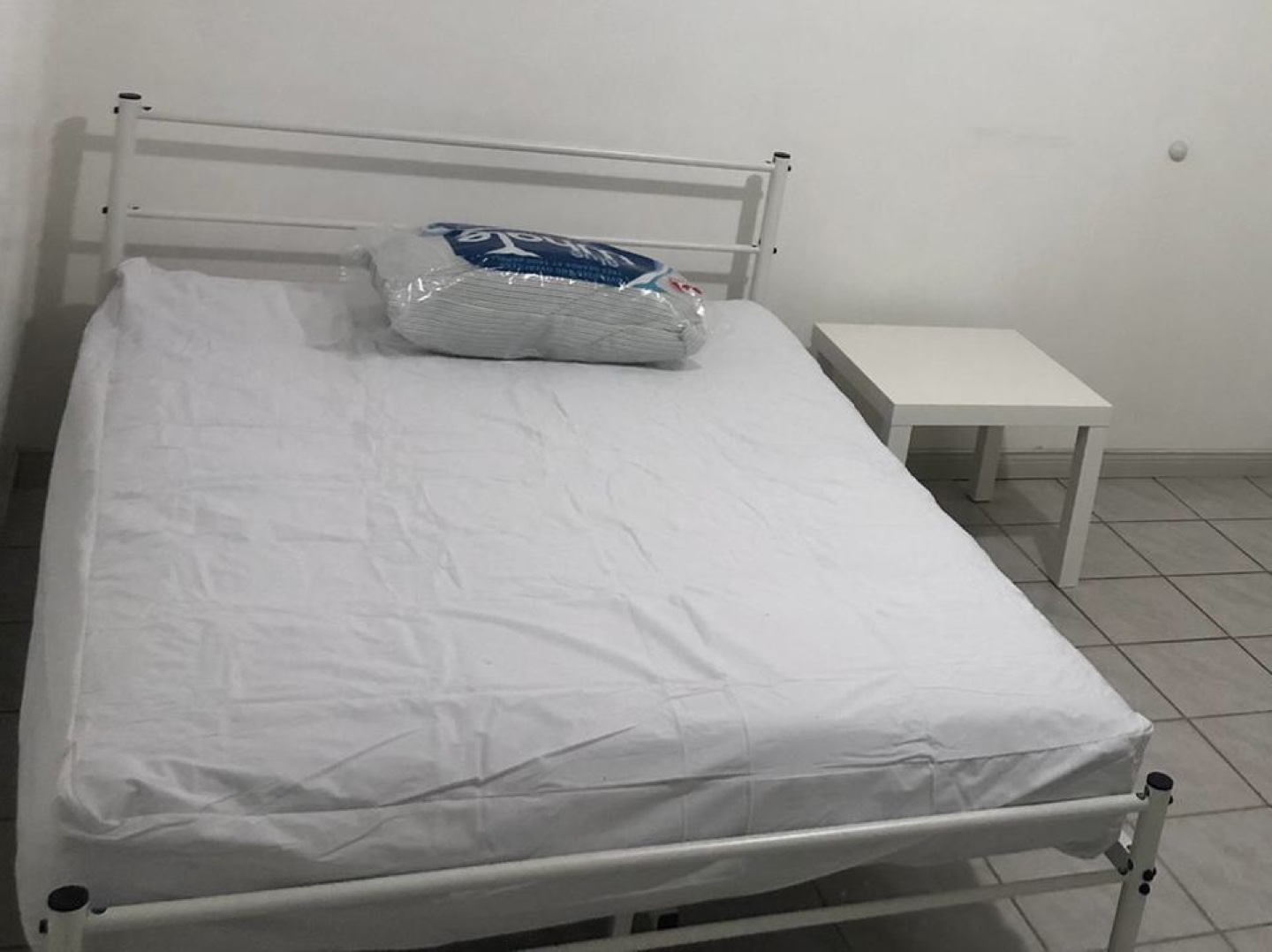 Queen Mattress in White Mattress Protector