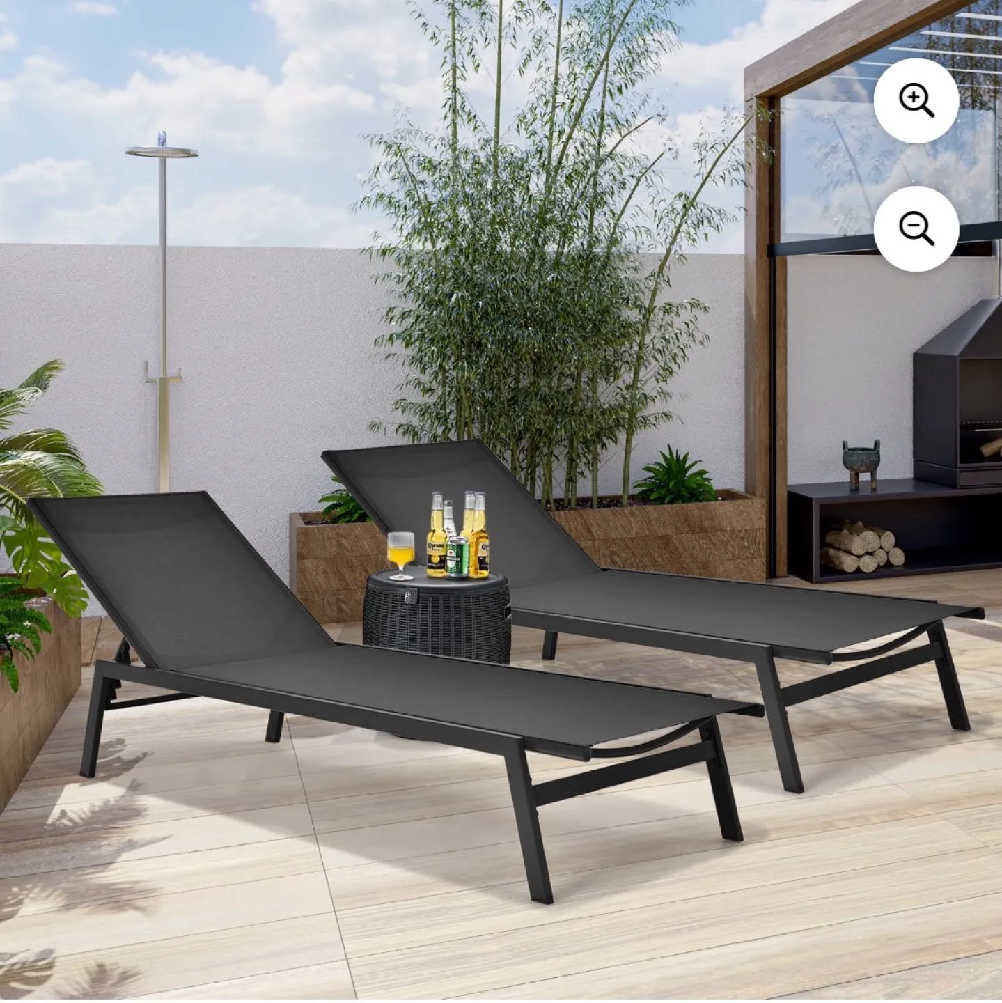 Pair of Black Metal and Textilene Chaise Lounges image indicator(2)