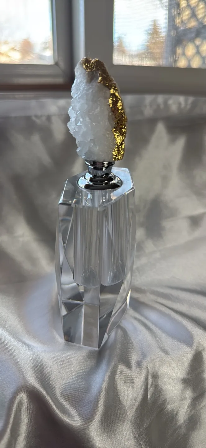 Unique Crystal Perfume Bottle with Gold Accents image indicator(2)