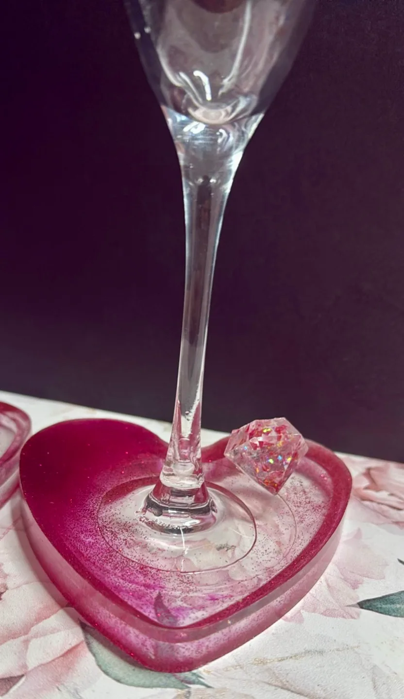 Champagne flutes with handmade resin heart coasters image indicator(5)