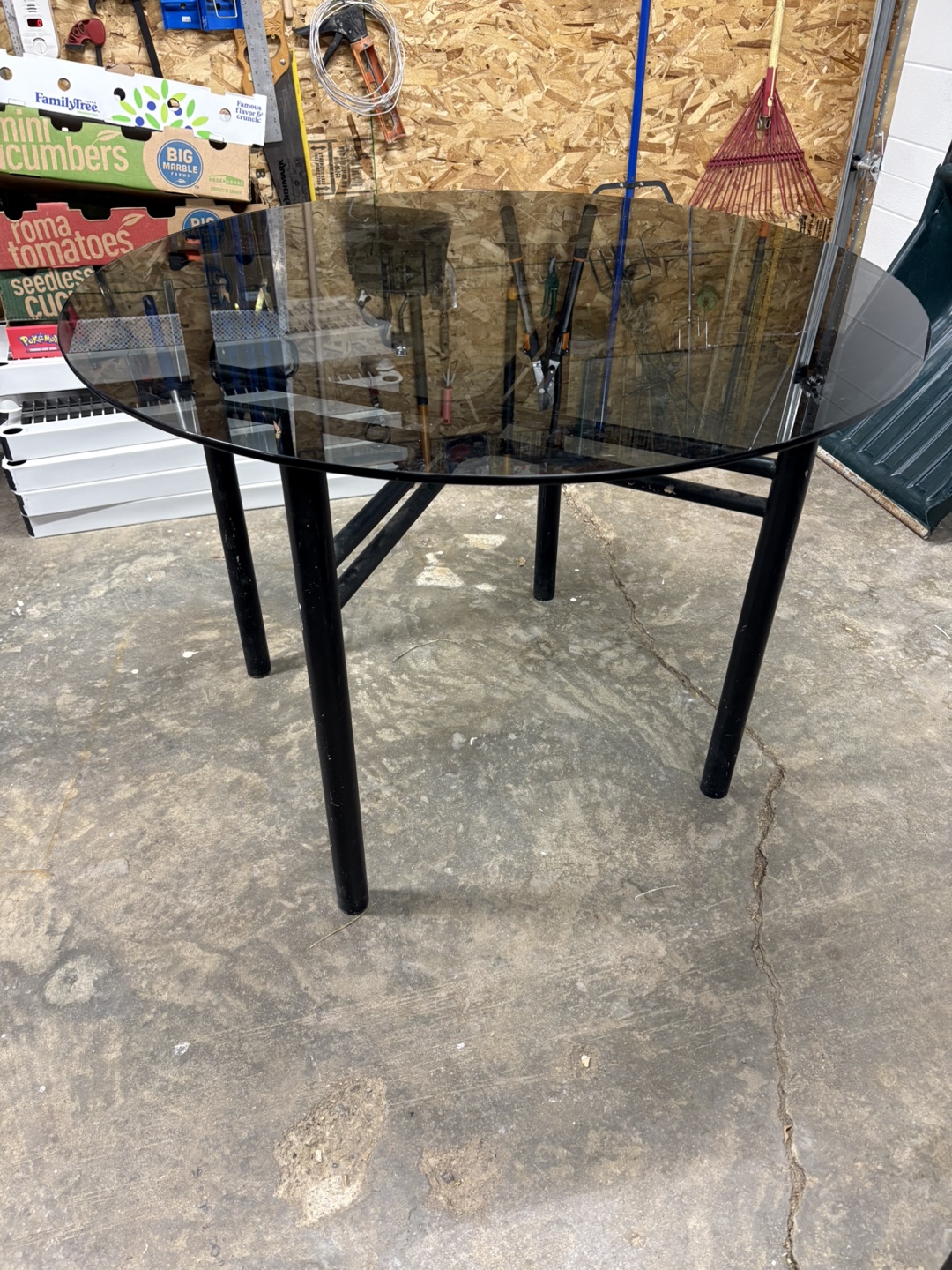 Round Glass Dining Table with Black Metal Legs - photo 2