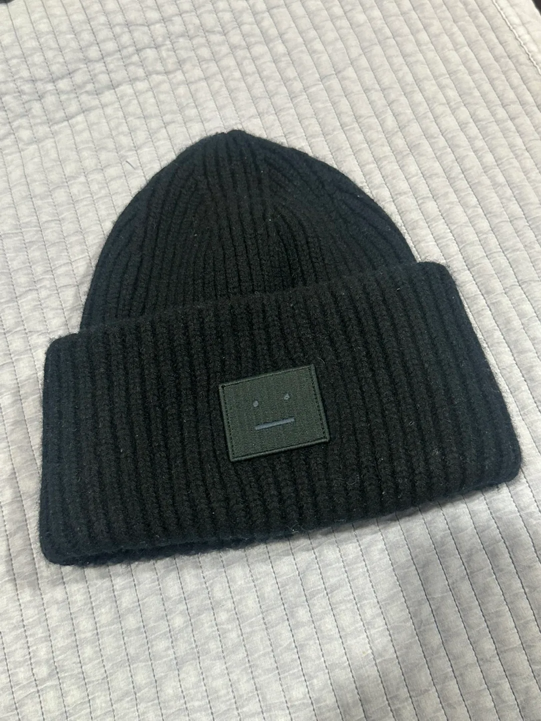 Acne Studios Black Beanie ($250 -> $65)
