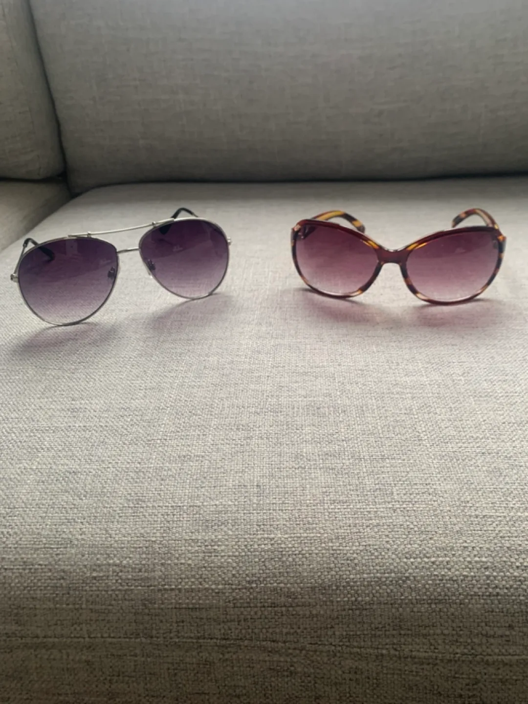Two pairs of sunglasses thumbnail