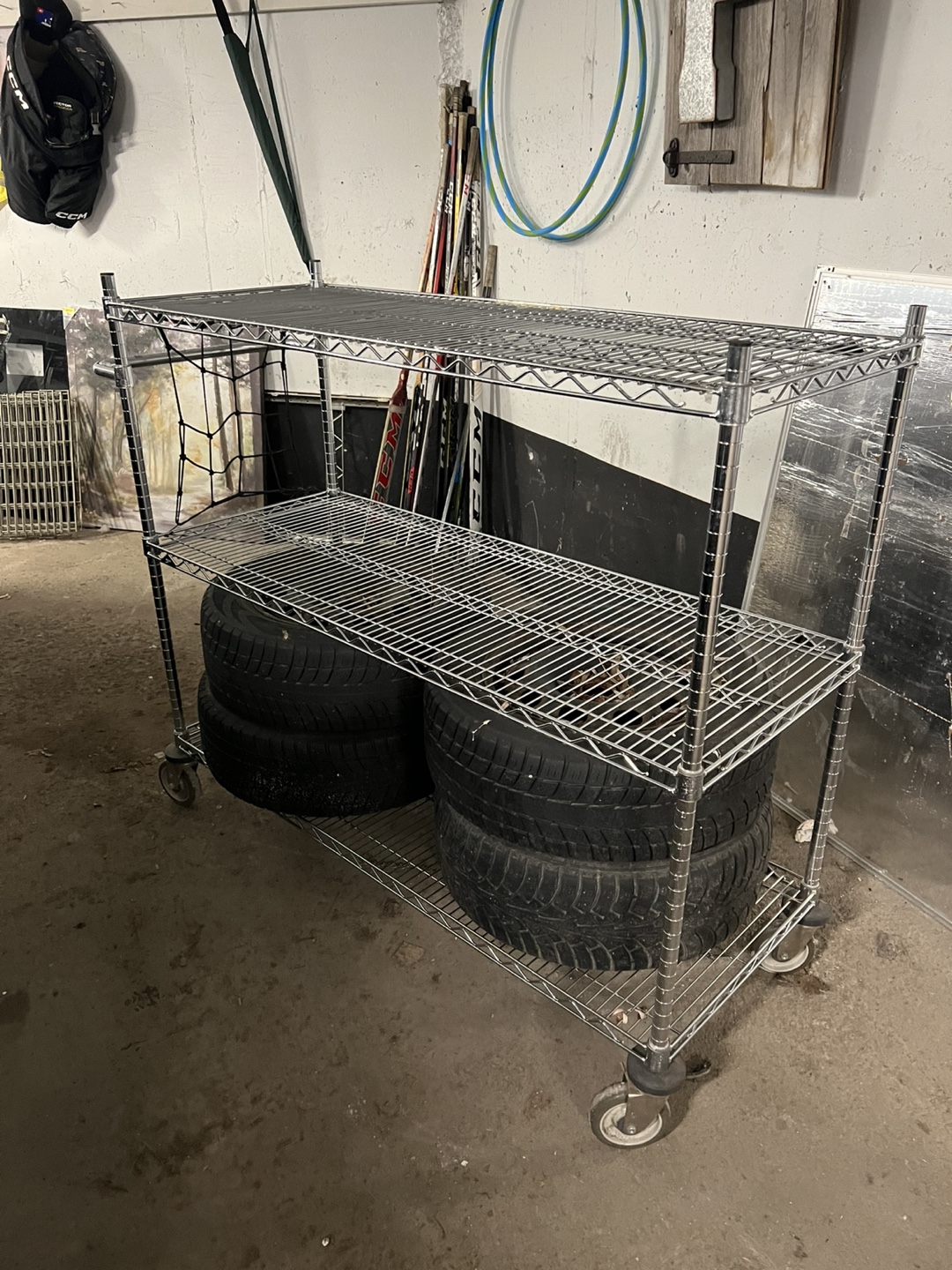Three-shelf rolling cart with wheels