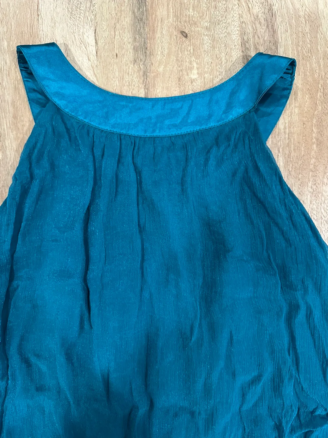 Teal embellished sleeveless blouse image indicator(2)