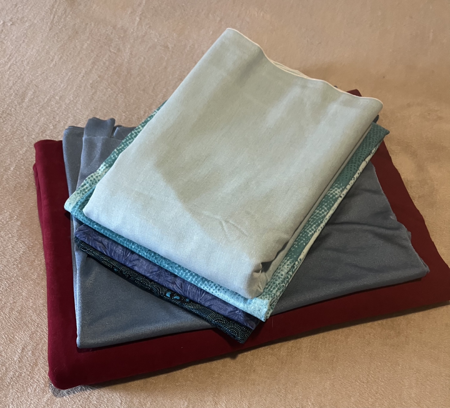 Assortment of fabrics for crafting/sewing projects