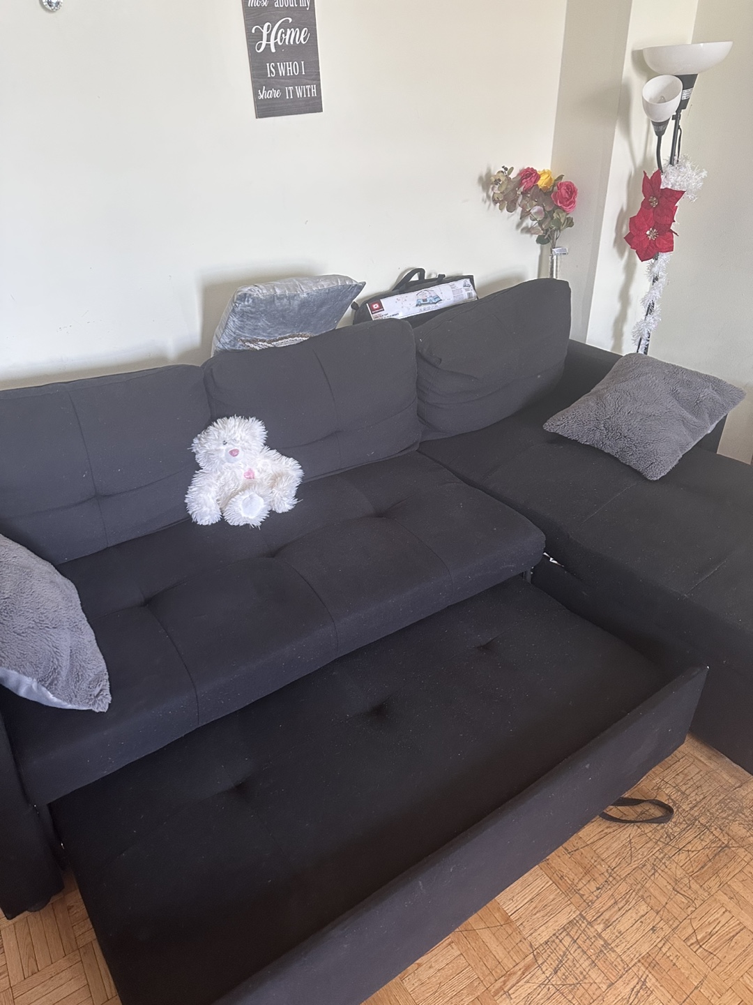 Black Sectional Sofa with Pull-Out Sleeper