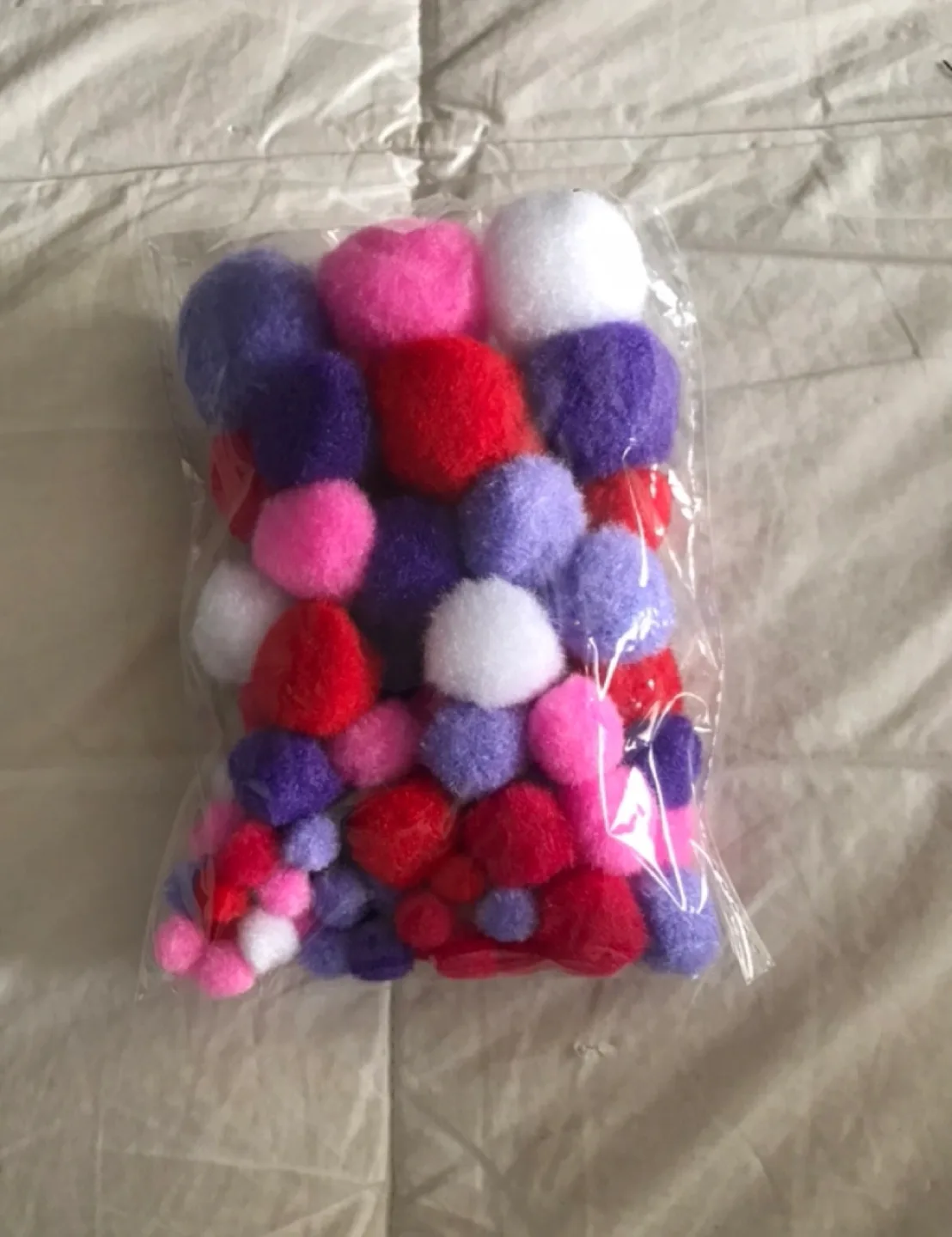 $1 Assorted Items-Book,Hearts,Pompoms,silver plate. image indicator(2)