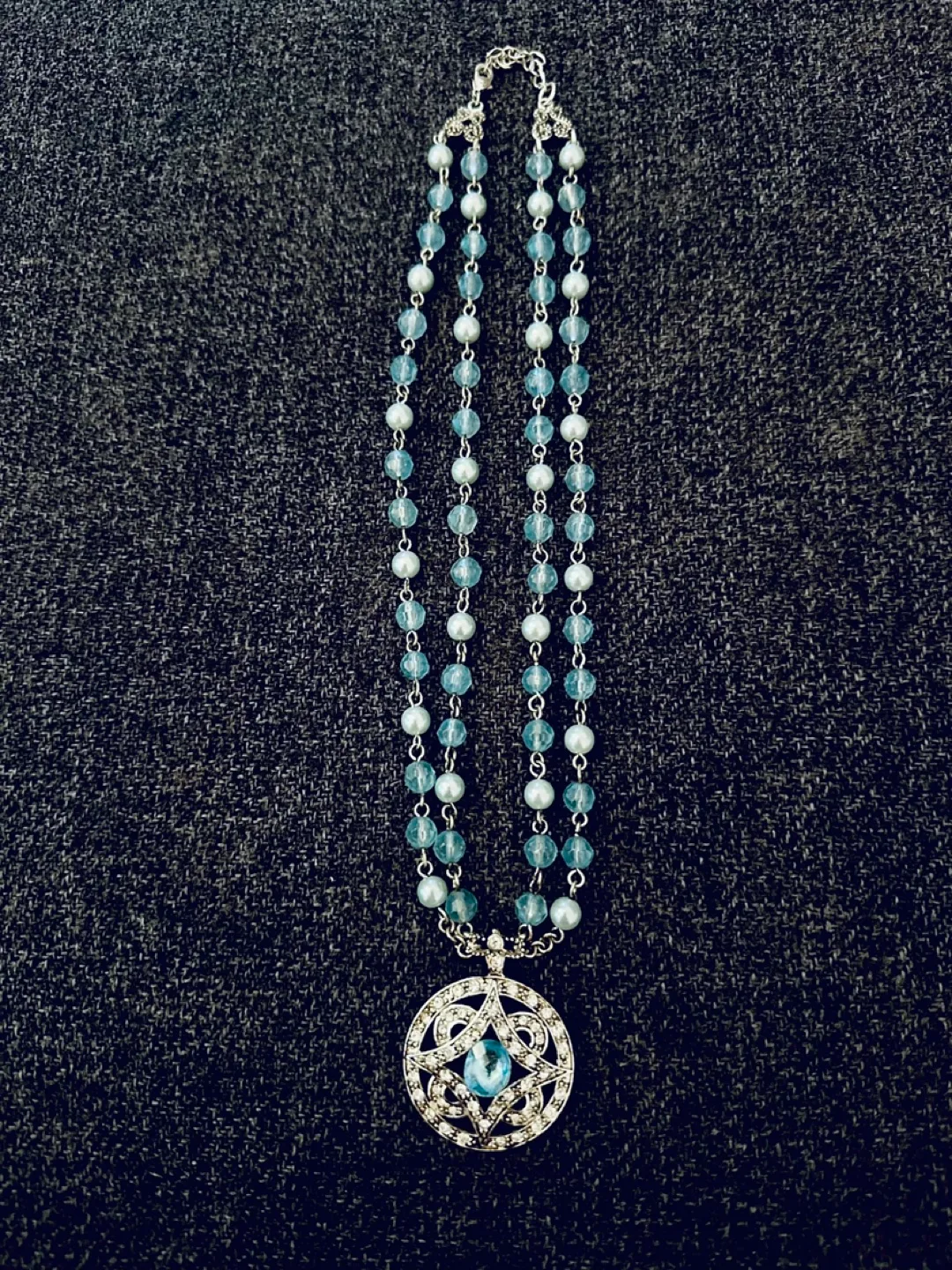 Elegant Beaded Necklace with Silver Pendant thumbnail