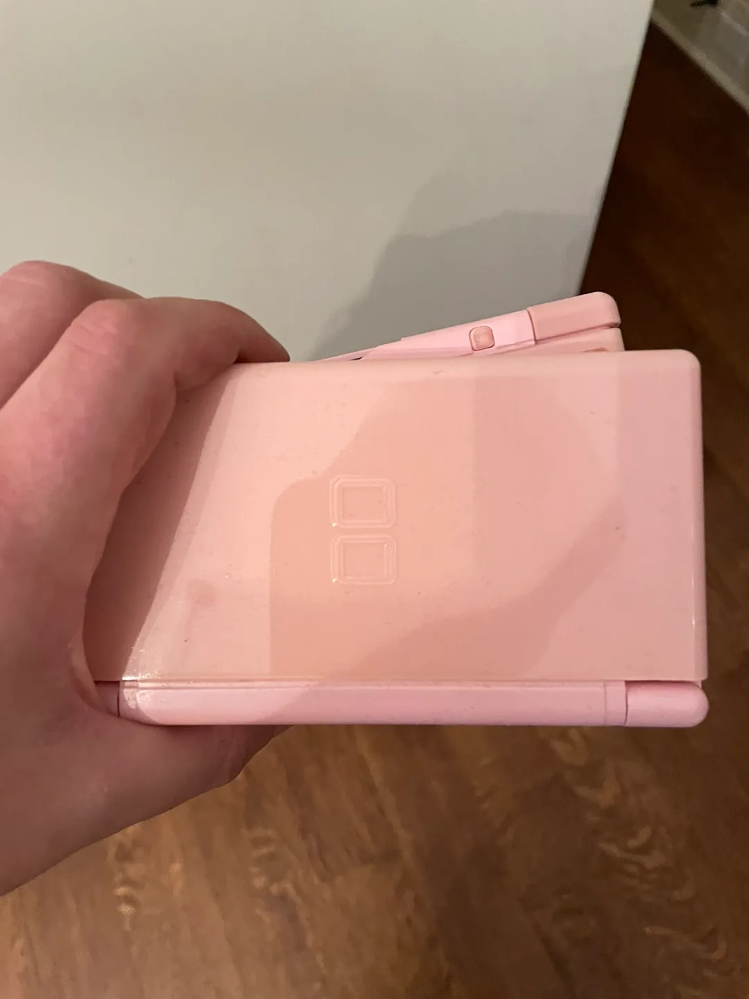 Pink Nintendo DS Lite two of them (one reserved) image indicator(2)