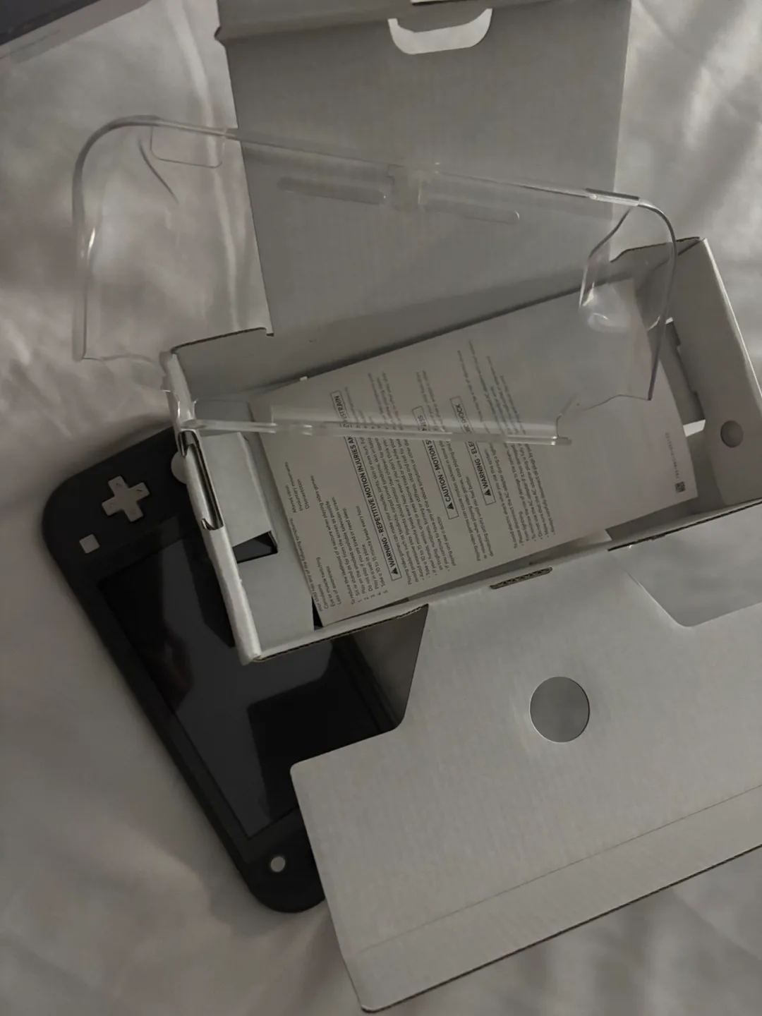 Nintendo Switch Lite - Grey (New) image indicator(4)