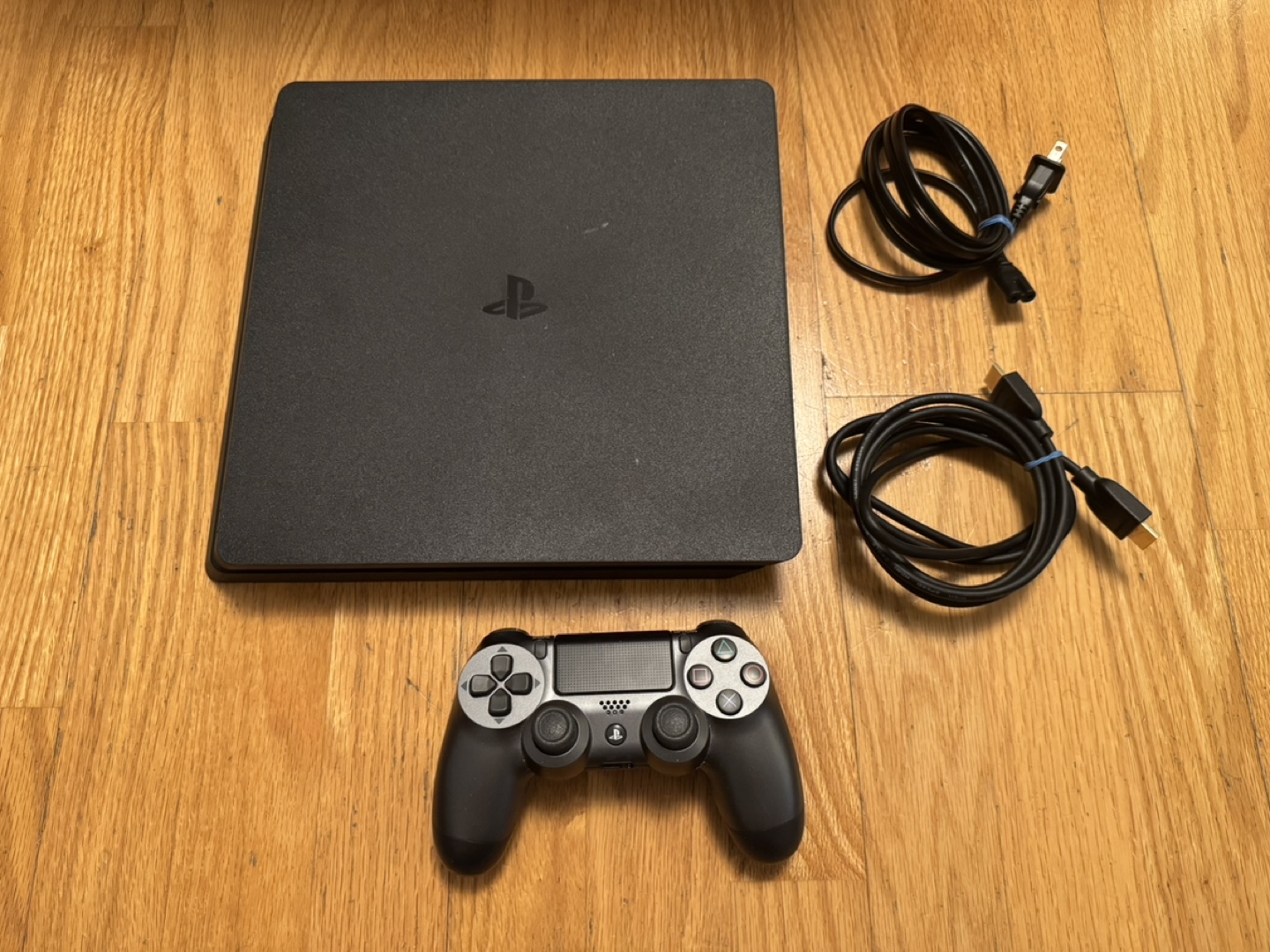 PS4 Slim Console with Controller and Cables