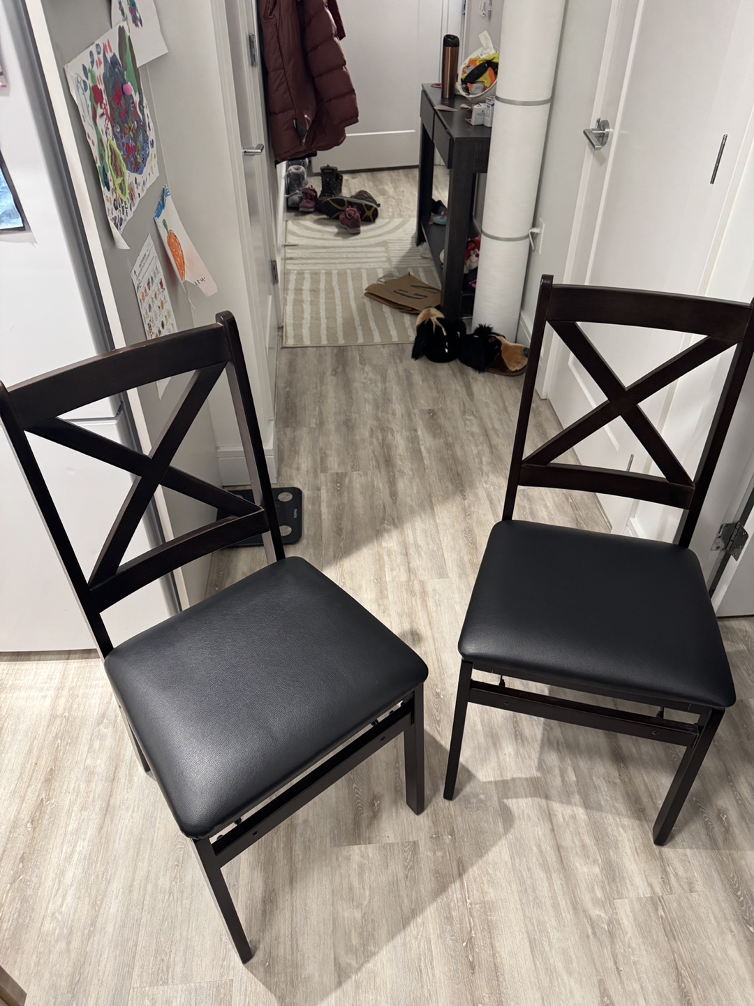Pair of Dark Brown Folding Chairs with Black Cushions