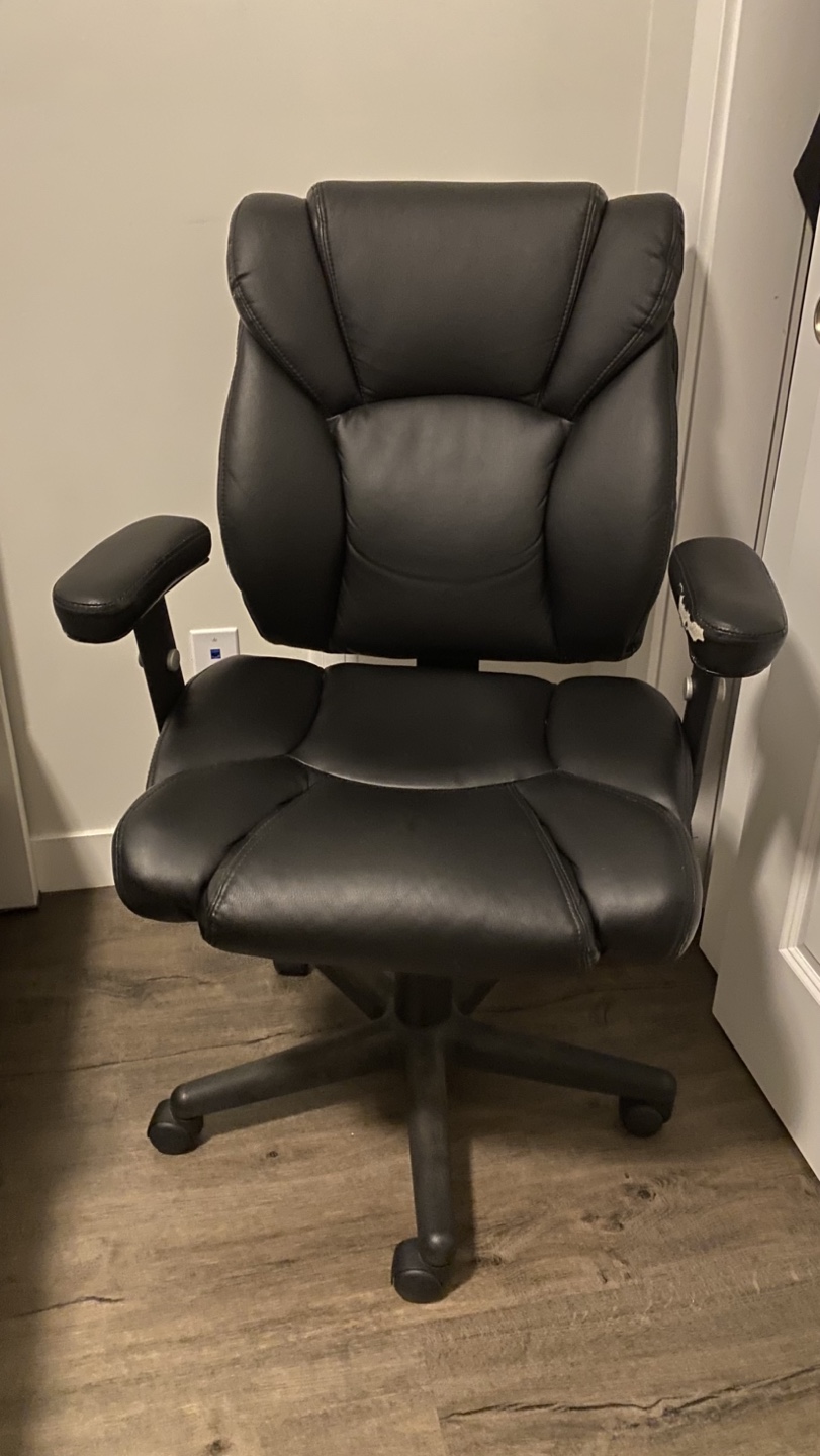 Black Office Chair with Armrest Damage