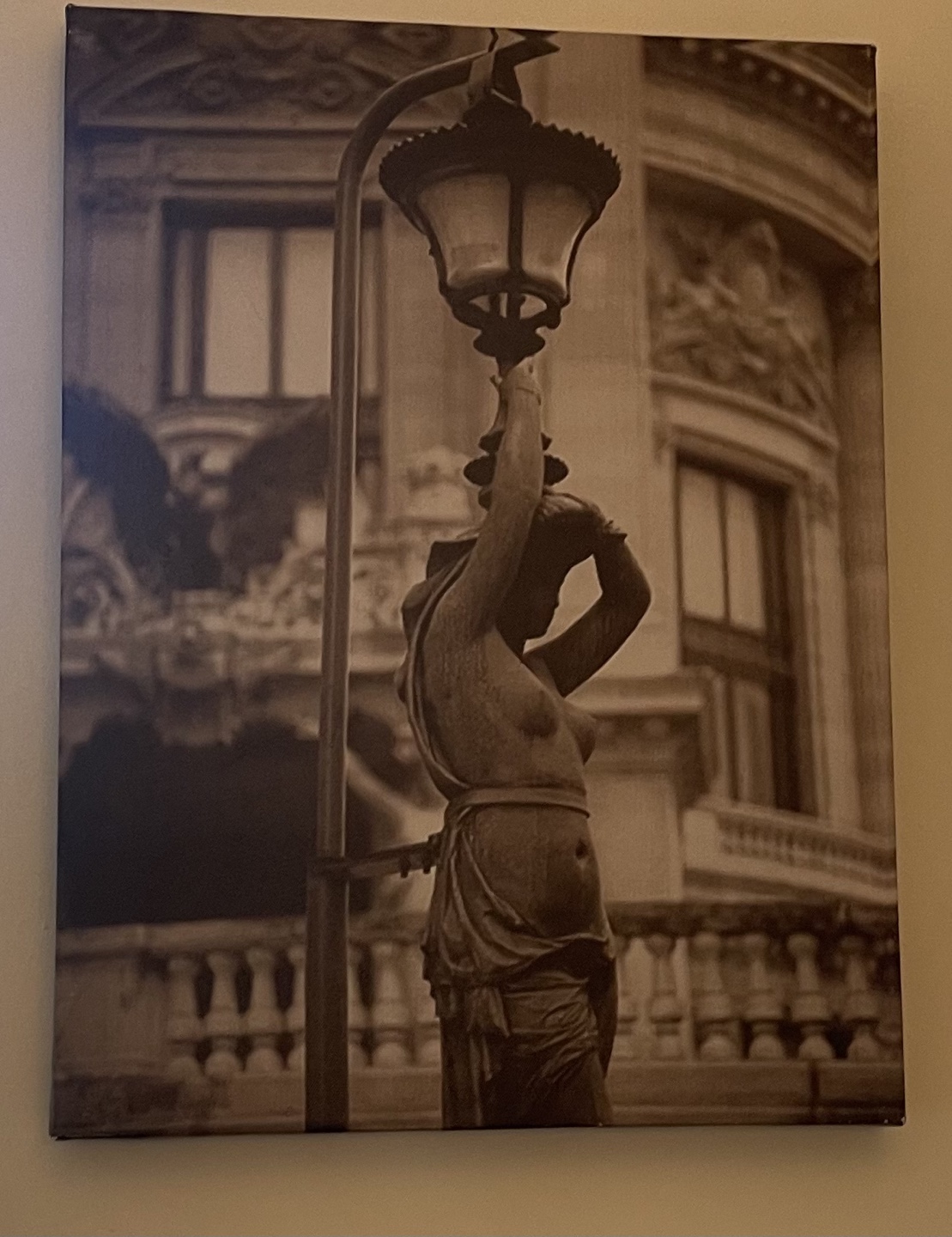 Sepia-toned Canvas Print of Statue and Lamppost