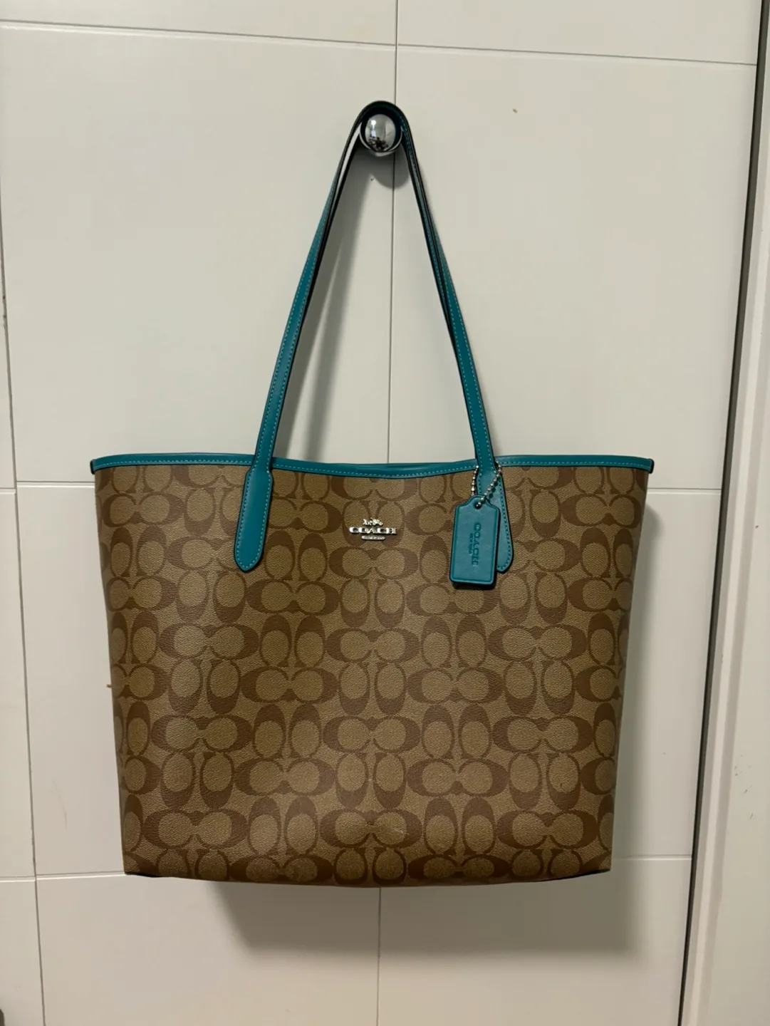 Coach tote bag, brown signature canvas with teal accents image indicator(3)
