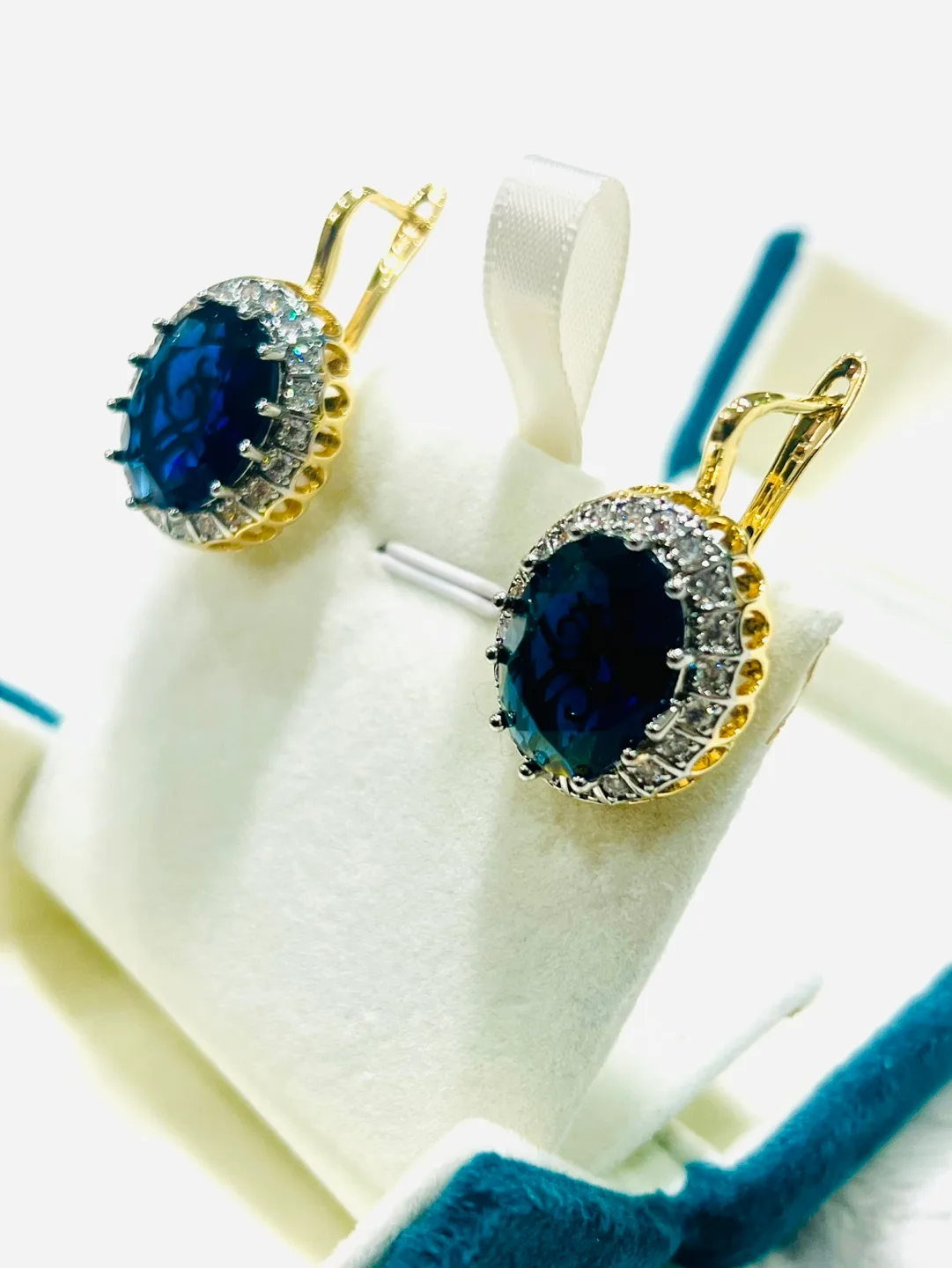Elegant Gold-Tone Oval Blue Gemstone Earrings image indicator(3)