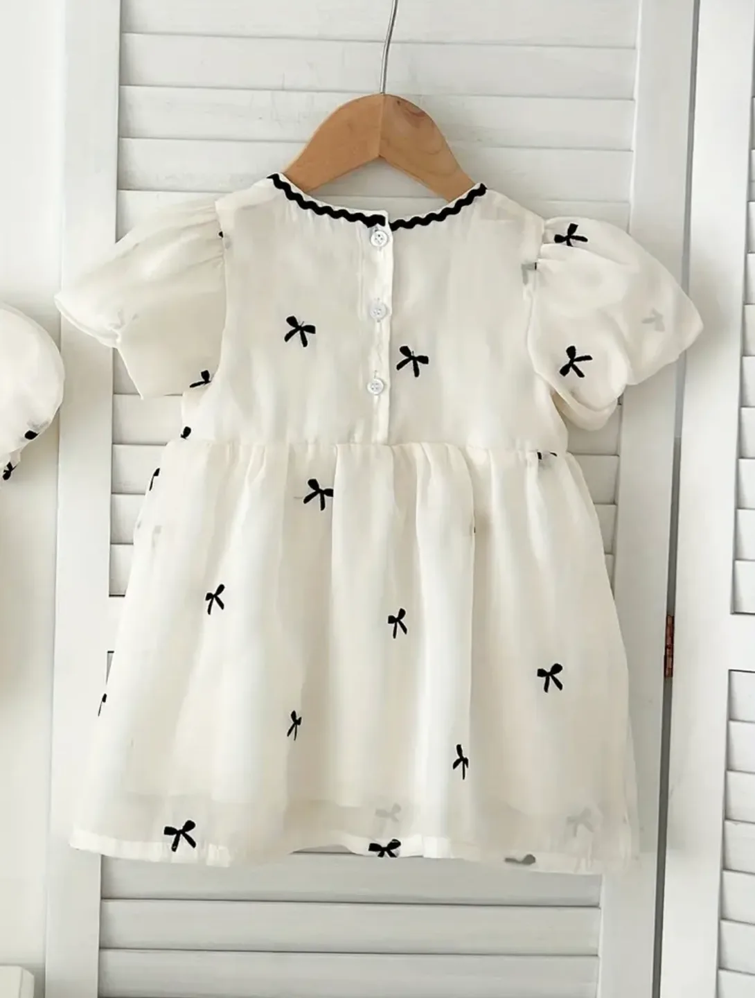Adorable Baby Girl's Off-White Bow Dress image indicator(2)