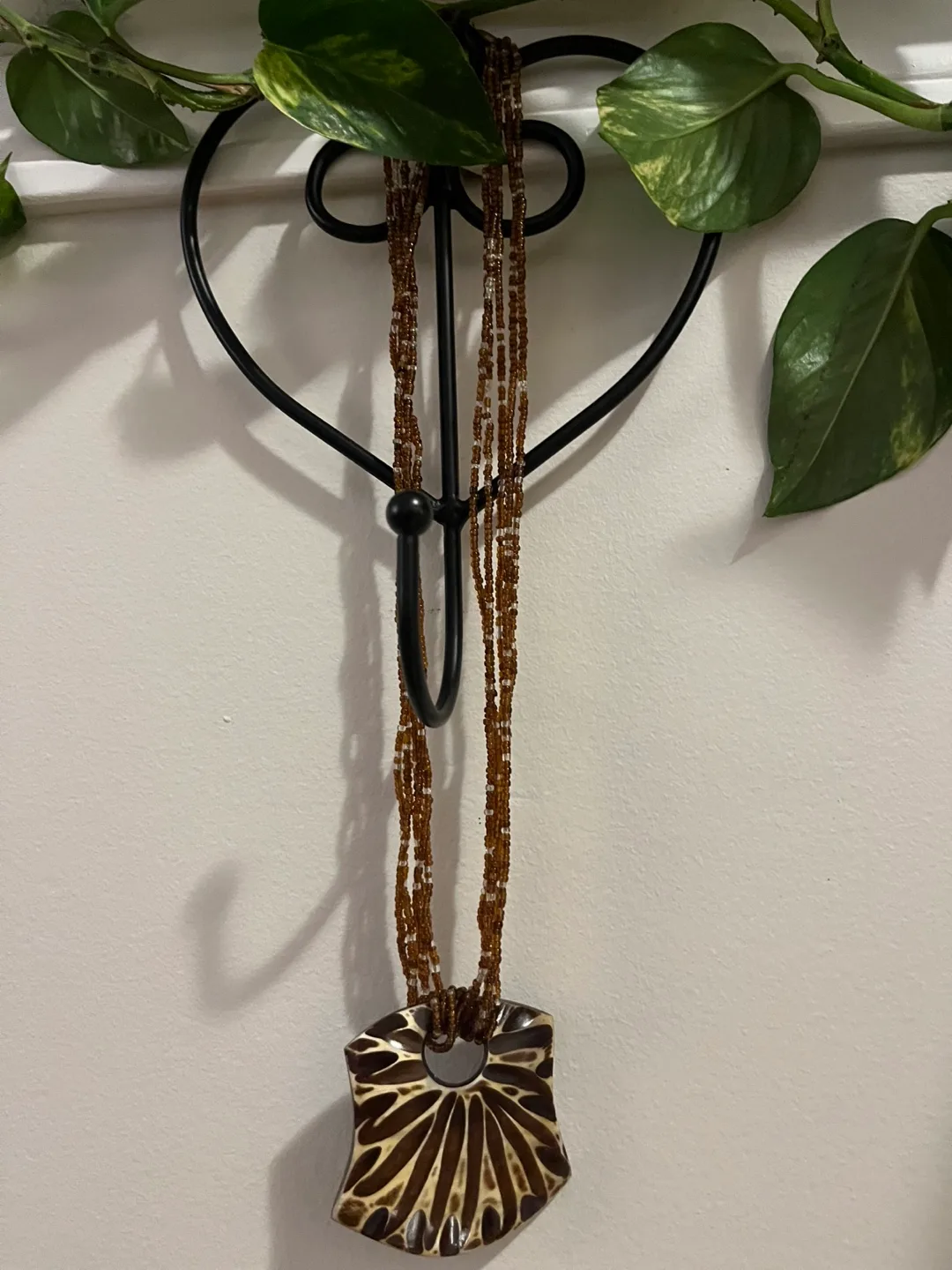 Unique Beaded Necklace with Intricate Pendant image indicator(6)