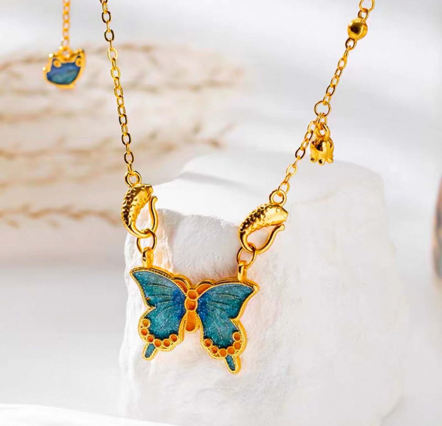 Delicate Gold Butterfly Necklace with Blue Enamel Accents - photo 2