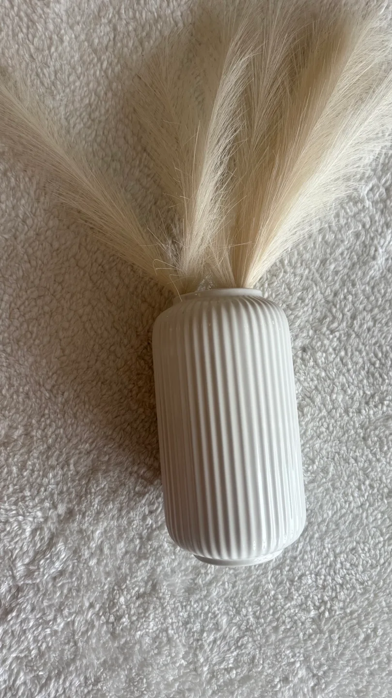 White ceramic vase with pampas grass thumbnail