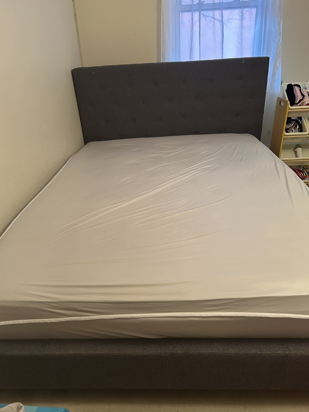 Queen-size upholstered bed frame with headboard
