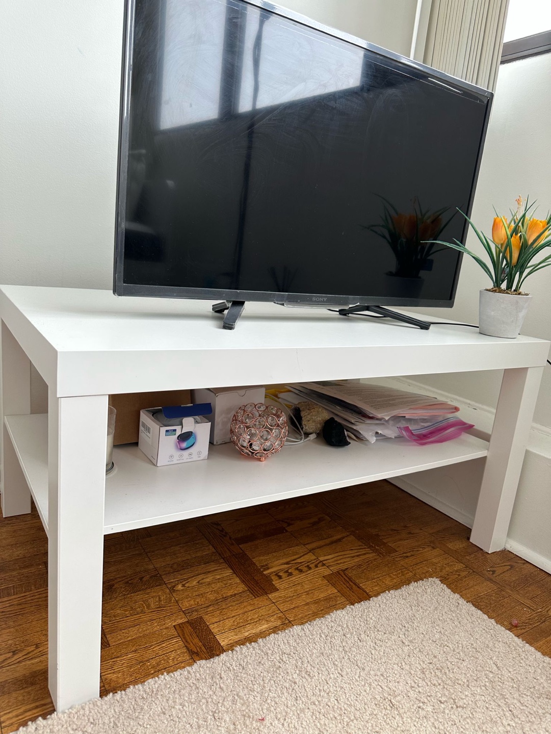 White TV Stand with Shelf