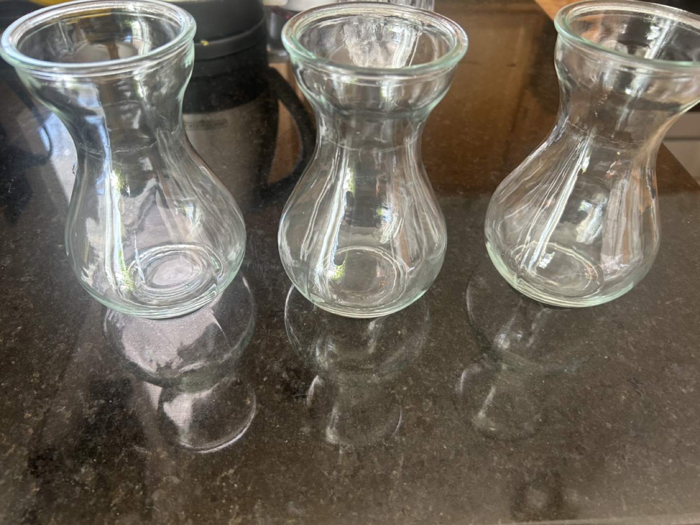 Set of three mini glass vases