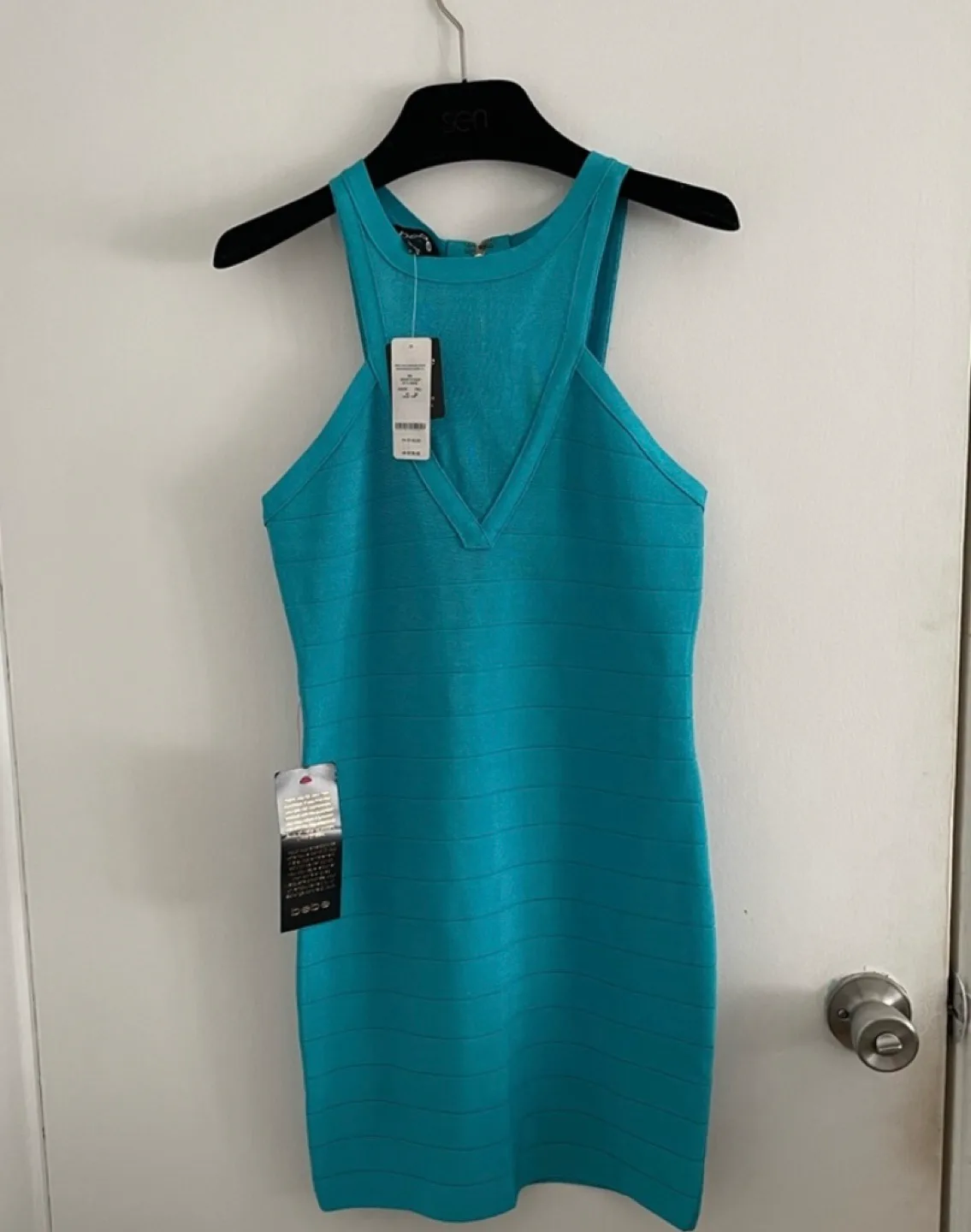 NWT BEBE Turquoise Bandage Mini Dress image indicator(4)