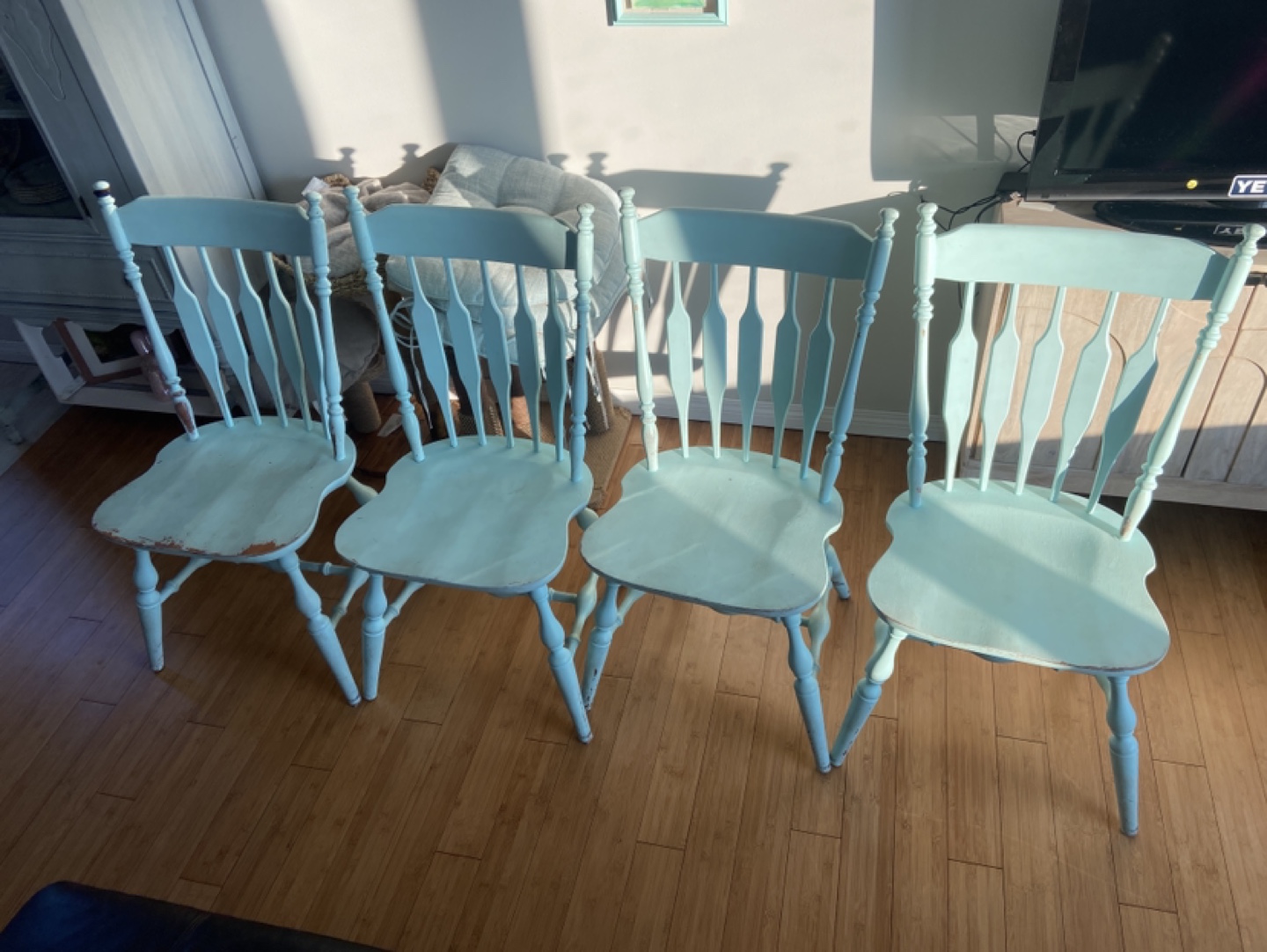 Set of Four Light Teal Wooden Chairs