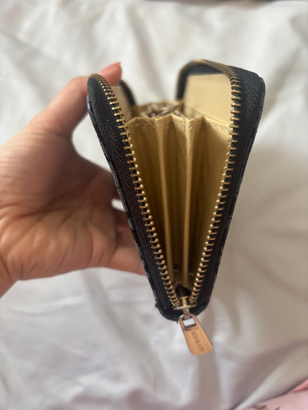 Michael Kors Black and Grey Signature Zip-Around Wallet image indicator(6)