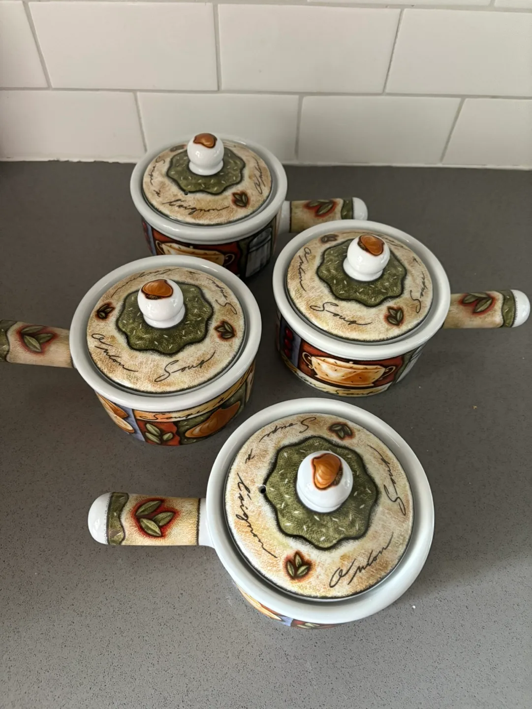 Set of four ceramic soup crocks with lids image indicator(2)