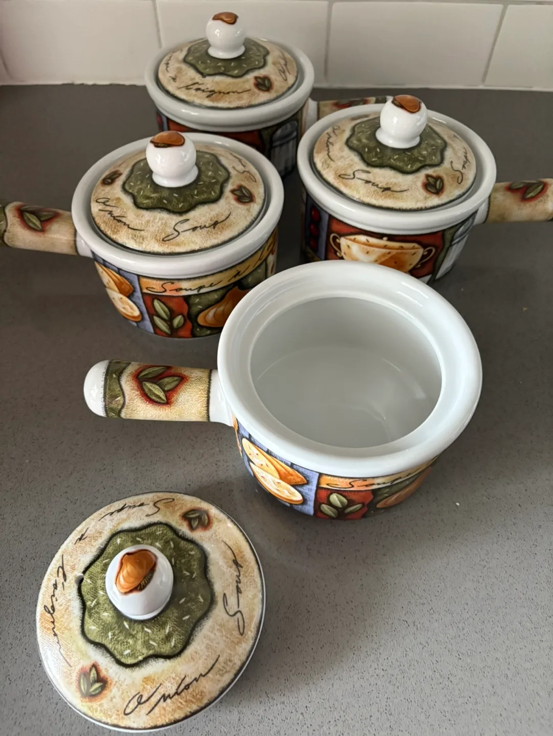 Set of four ceramic soup crocks with lids image indicator(3)