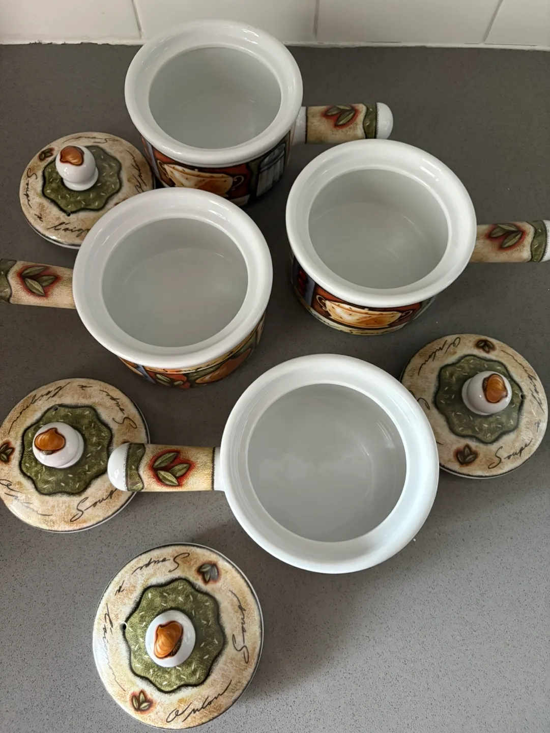 Set of four ceramic soup crocks with lids image indicator(4)
