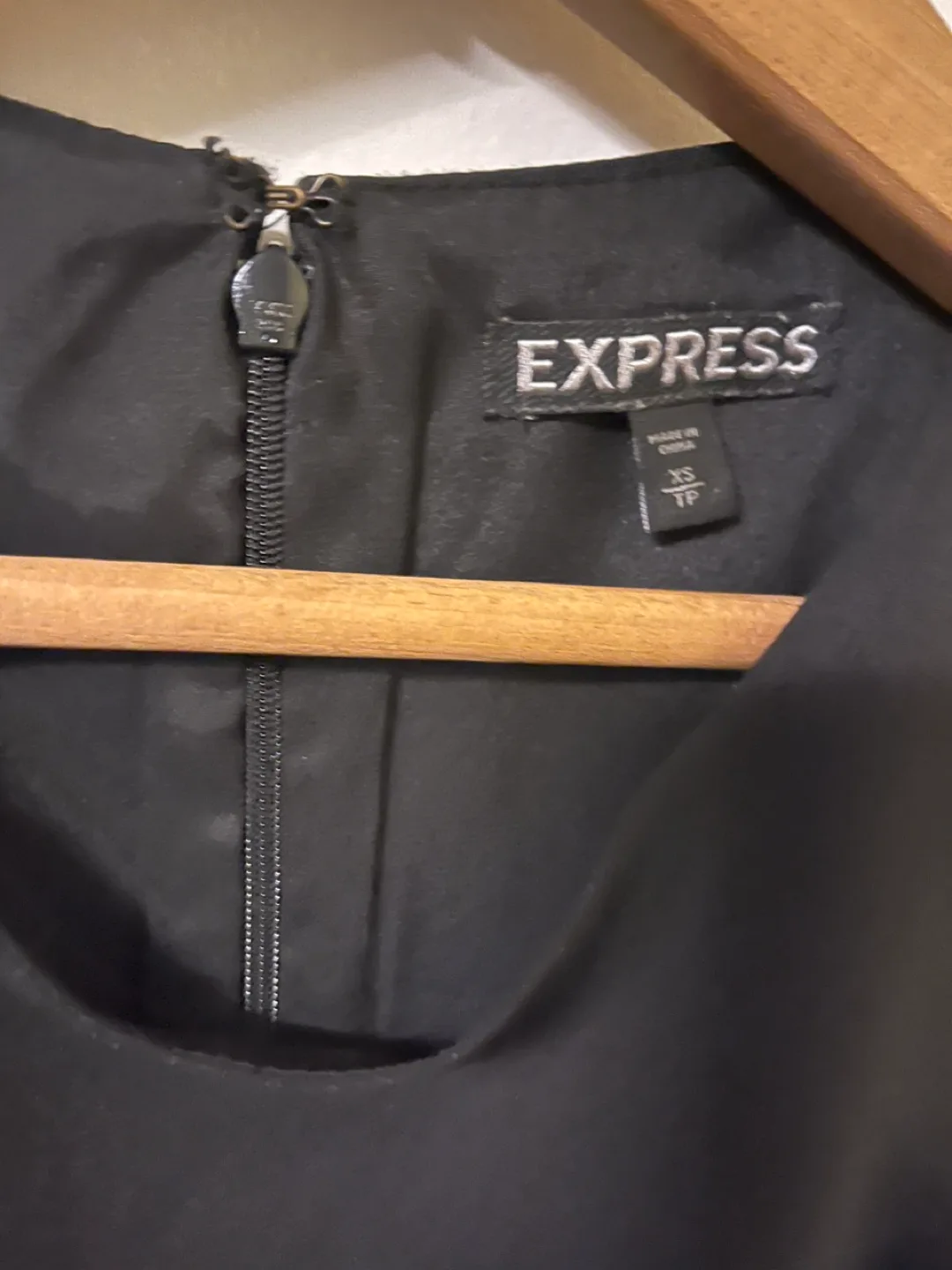 Sleeveless Black Peplum Top, Size XS image indicator(3)